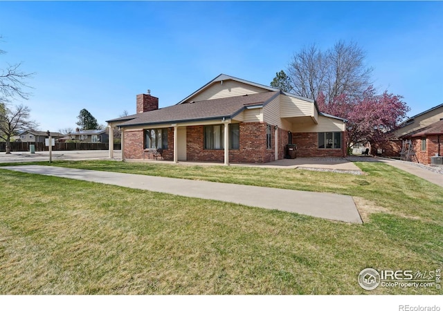4560 Larkbunting Dr Unit 2B, Fort Collins, CO 80526 - ranch-style home with a chimney, brick siding, a front yard, a shingled roof, and central air condition unit