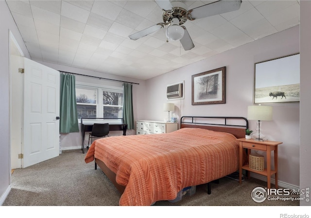 carpeted bedroom with baseboards, ceiling fan, and an AC wall unit