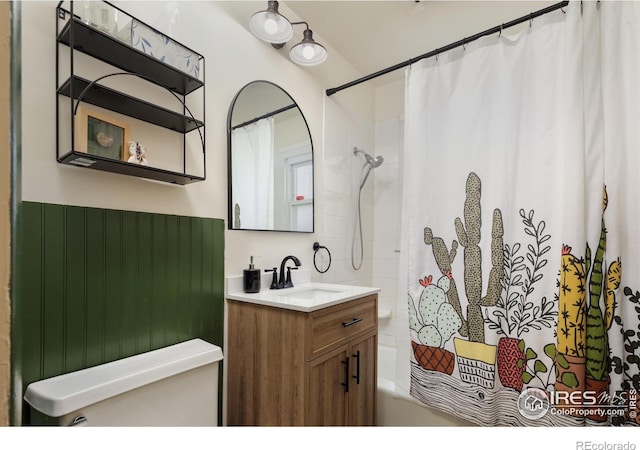 bathroom with vanity and shower / bath combo