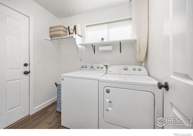 109 Whitney Ct, Windsor, CO 80550 - laundry room featuring washer and clothes dryer, dark wood finished floors, and baseboards