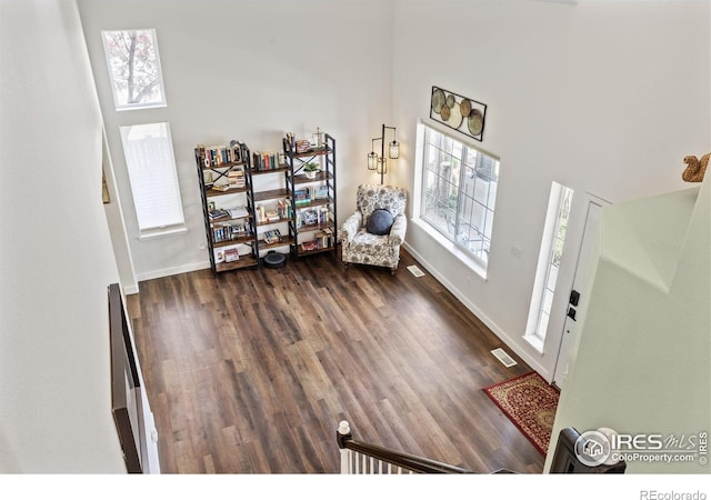 109 Whitney Ct, Windsor, CO 80550 - entrance foyer featuring dark wood-style floors and baseboards