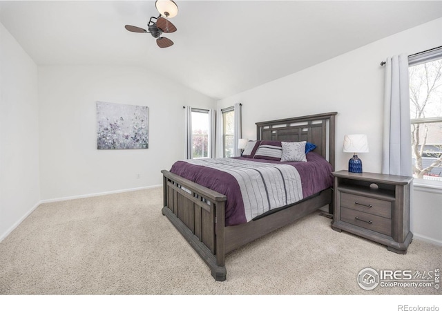 109 Whitney Ct, Windsor, CO 80550 - carpeted bedroom with lofted ceiling, multiple windows, baseboards, and a ceiling fan