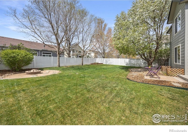 109 Whitney Ct, Windsor, CO 80550 - view of yard with an outdoor fire pit and a patio