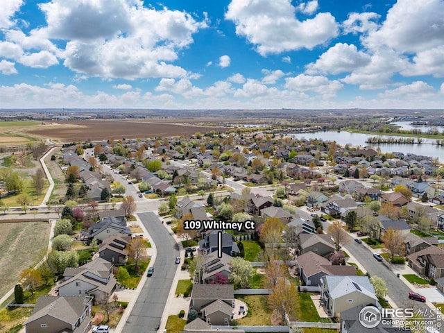 109 Whitney Ct, Windsor, CO 80550 - aerial view of property's location with a nearby body of water and nearby suburban area