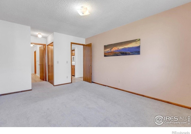 5035 W 73rd Ave, Westminster, CO 80030 - unfurnished room featuring baseboards, carpet flooring, and a textured ceiling