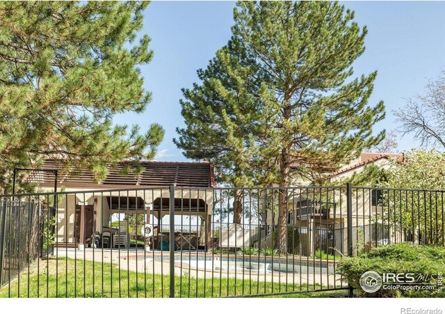 5035 W 73rd Ave, Westminster, CO 80030 - view of gate featuring fence