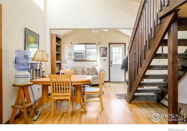 1800 Sumac Ave, Boulder, CO 80304 - dining area with vaulted ceiling, light wood finished floors, stairs, and cooling unit