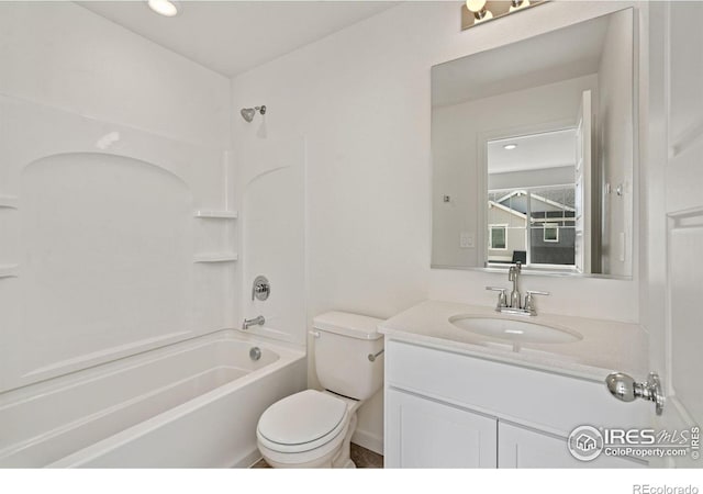 full bathroom featuring vanity, toilet,  shower combination, and recessed lighting