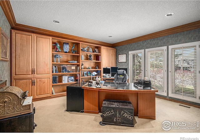 office area with crown molding, light colored carpet, and wallpapered walls