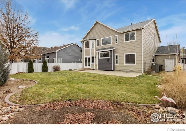 rear view of property featuring fence, cooling unit, and a patio area