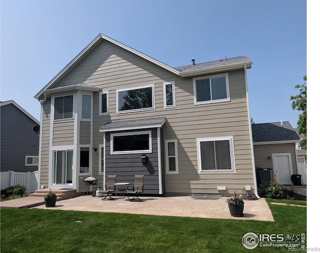 116 Rock Bridge Ct, Windsor, CO 80550 - back of house featuring a patio and central AC