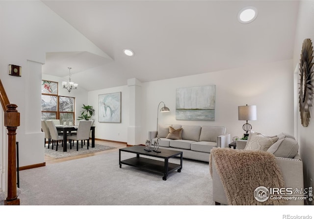 4866 Franklin Dr, Boulder, CO 80301 - carpeted living room featuring baseboards, a notable chandelier, recessed lighting, and lofted ceiling