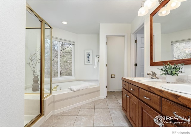 4866 Franklin Dr, Boulder, CO 80301 - bathroom with a sink, double vanity, tile patterned floors, an enclosed shower, and a garden tub