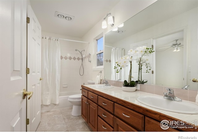 4866 Franklin Dr, Boulder, CO 80301 - bathroom with double vanity, a sink, shower / tub combo with curtain, and toilet