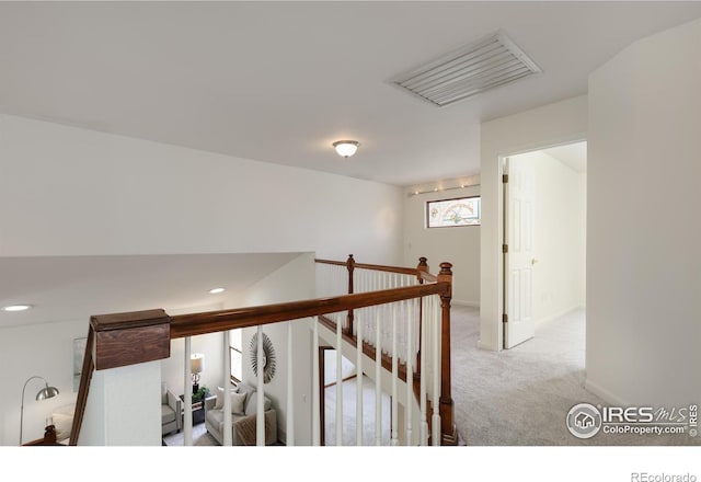 4866 Franklin Dr, Boulder, CO 80301 - hall with visible vents, carpet floors, baseboards, recessed lighting, and an upstairs landing