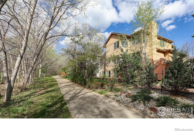 4866 Franklin Dr, Boulder, CO 80301 - view of side of home featuring a chimney