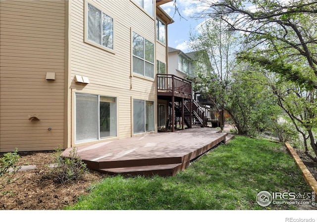 4866 Franklin Dr, Boulder, CO 80301 - rear view of property with a wooden deck, a yard, and stairway