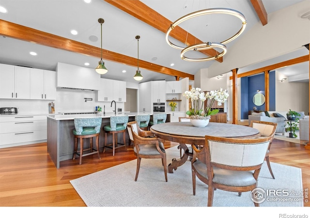 1533 Old Tale Rd, Boulder, CO 80303 - dining room featuring recessed lighting, vaulted ceiling with beams, and light wood finished floors