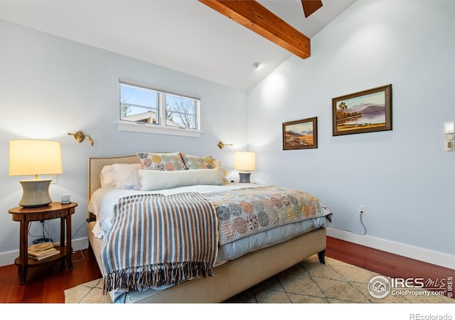 1533 Old Tale Rd, Boulder, CO 80303 - bedroom with baseboards, vaulted ceiling with beams, and wood finished floors