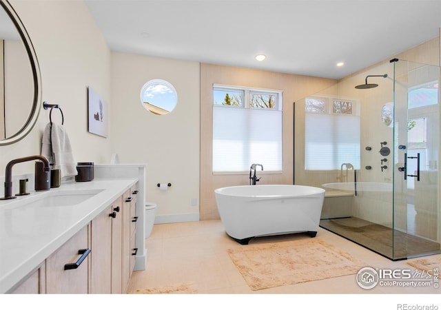 1533 Old Tale Rd, Boulder, CO 80303 - full bath with vanity, a soaking tub, a stall shower, and a wealth of natural light