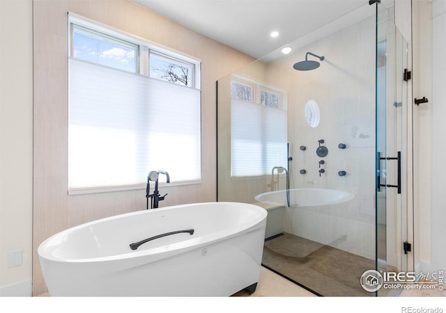 1533 Old Tale Rd, Boulder, CO 80303 - bathroom featuring a healthy amount of sunlight, a stall shower, and a freestanding bath