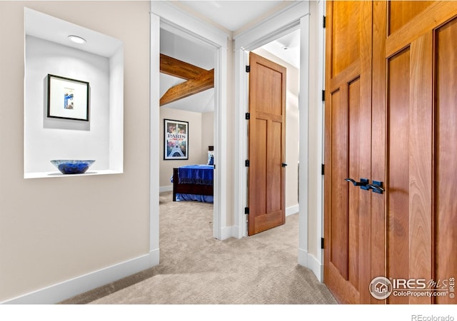 1533 Old Tale Rd, Boulder, CO 80303 - corridor featuring baseboards, beam ceiling, and light colored carpet