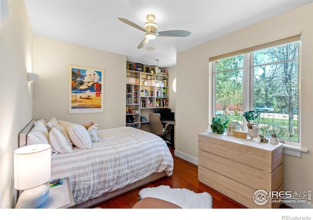 1533 Old Tale Rd, Boulder, CO 80303 - bedroom featuring baseboards, ceiling fan, and wood finished floors