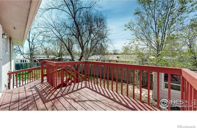 deck featuring a fenced backyard