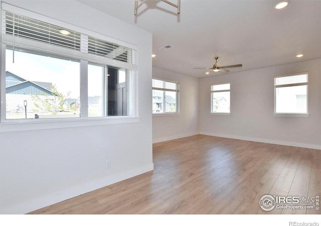 unfurnished room featuring baseboards, wood finished floors, recessed lighting, and ceiling fan