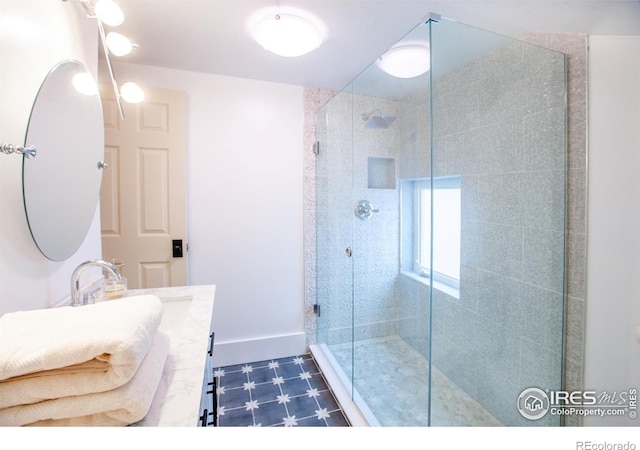 1114 5th Ave, Longmont, CO 80501 - bathroom with vanity, tile patterned floors, and a shower stall