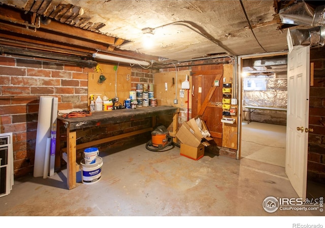 1114 5th Ave, Longmont, CO 80501 - unfinished below grade area featuring a workshop area