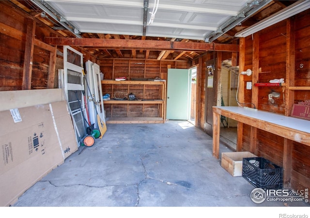 1114 5th Ave, Longmont, CO 80501 - garage featuring a workshop area