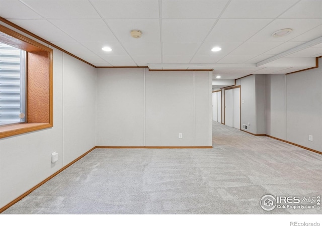 finished below grade area featuring carpet floors, recessed lighting, baseboards, and visible vents