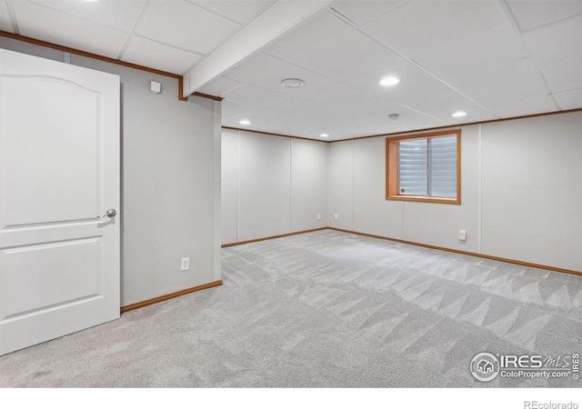 finished basement with carpet floors, baseboards, and recessed lighting