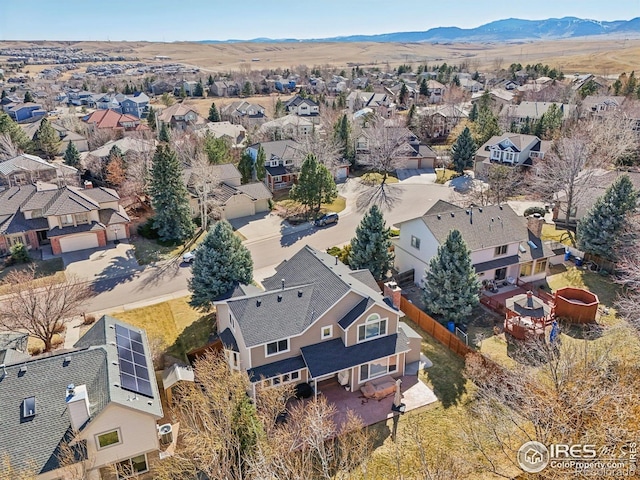 bird's eye view with a mountain view and a residential view