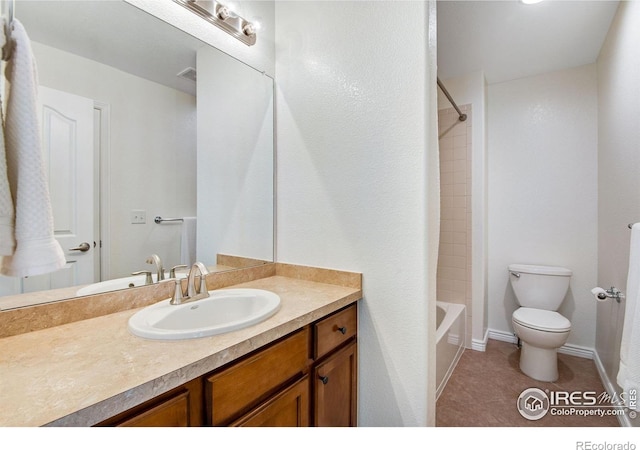 full bathroom with vanity, toilet, baseboards, tile patterned floors, and  shower combination