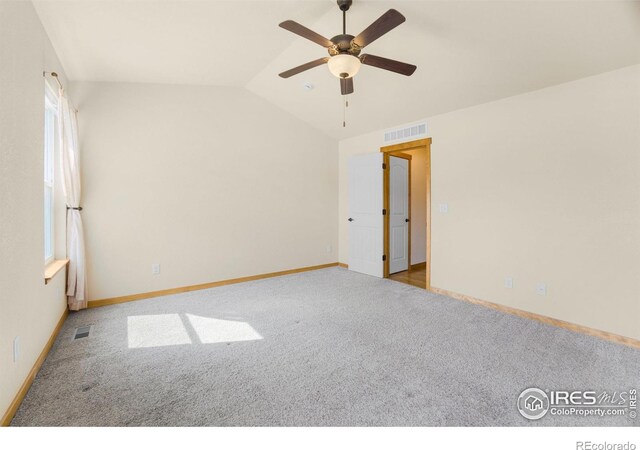 7056 Langland St, Wellington, CO 80549 - carpeted empty room featuring ceiling fan, baseboards, and vaulted ceiling