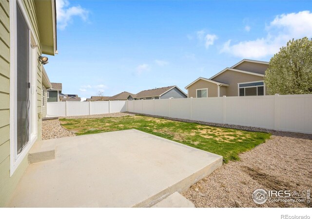 7056 Langland St, Wellington, CO 80549 - view of yard with a patio