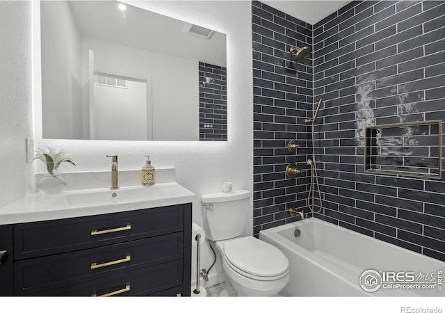 full bath featuring toilet, shower / bath combination, visible vents, and vanity