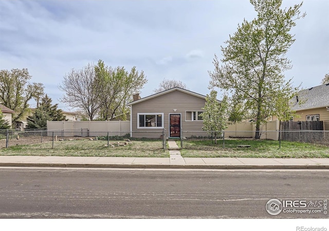 214 2nd St, Frederick, CO 80530 - view of front of house with a chimney