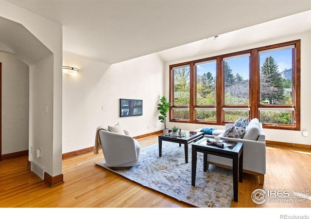 2499 Powderhorn Ln, Boulder, CO 80305 - living room with baseboards, visible vents, and light wood-type flooring