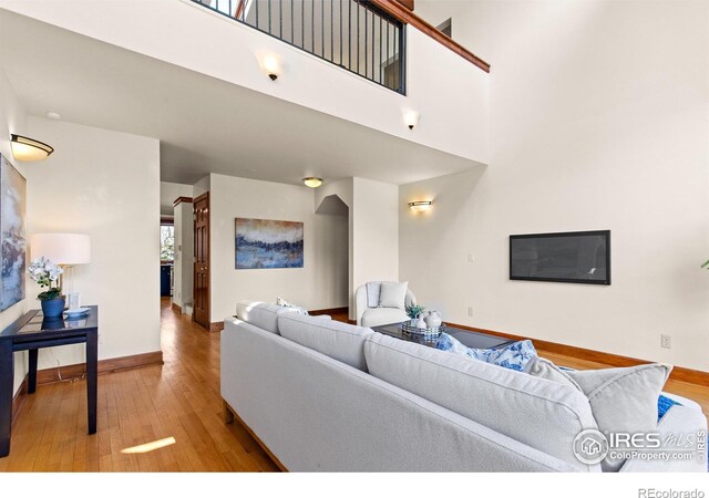 2499 Powderhorn Ln, Boulder, CO 80305 - living area with baseboards and wood finished floors