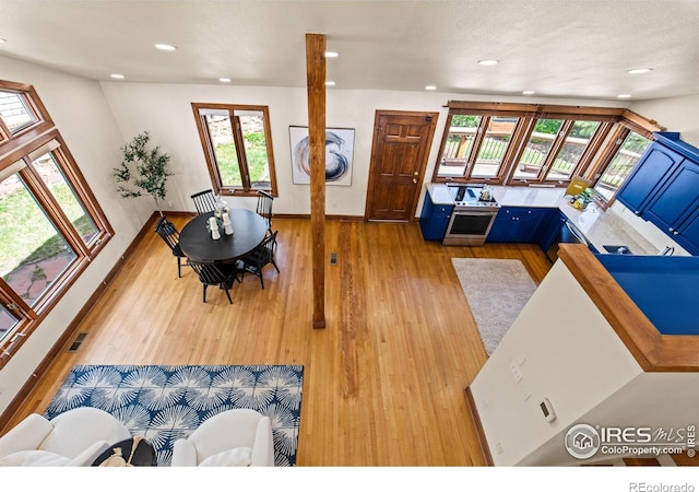 2499 Powderhorn Ln, Boulder, CO 80305 - living area with light wood-style floors, french doors, recessed lighting, baseboards, and visible vents