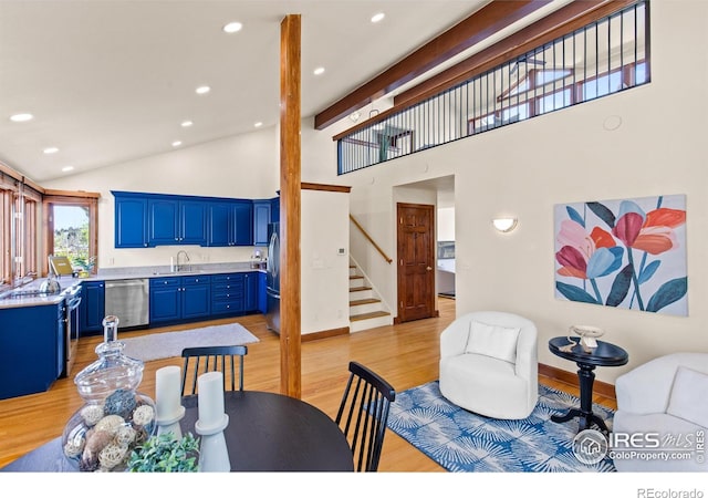 2499 Powderhorn Ln, Boulder, CO 80305 - living area featuring light wood-type flooring, stairway, baseboards, high vaulted ceiling, and recessed lighting