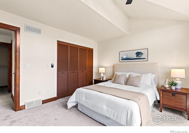 2499 Powderhorn Ln, Boulder, CO 80305 - bedroom with visible vents, carpet, vaulted ceiling, and a closet