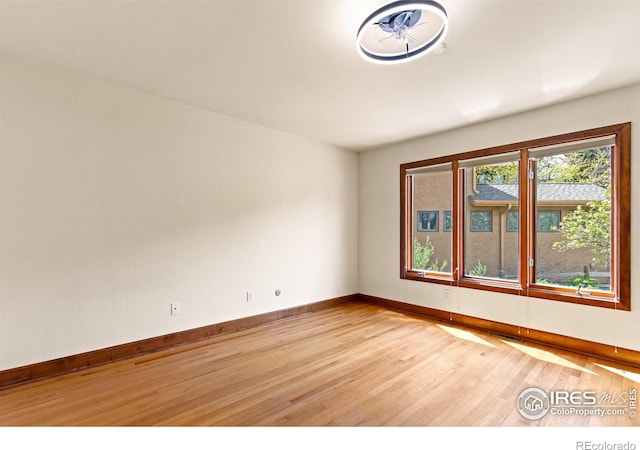 2499 Powderhorn Ln, Boulder, CO 80305 - spare room featuring baseboards and light wood finished floors