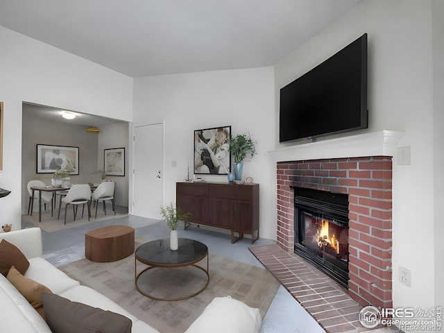 1094 S Dearborn St Unit 301, Aurora, CO 80012 - living area with a brick fireplace