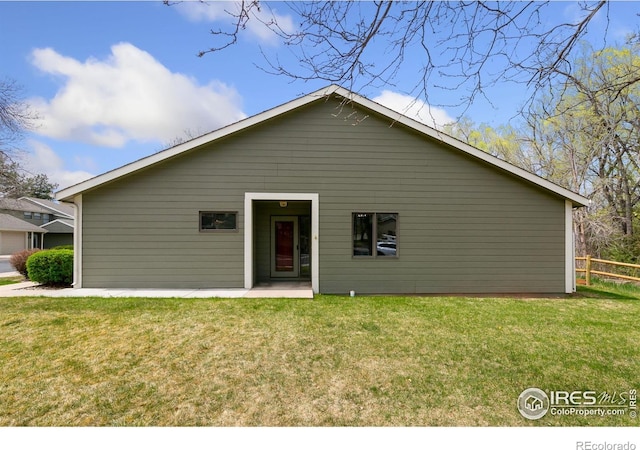 718 Brookhaven Ct, Fort Collins, CO 80525 - rear view of property featuring fence and a lawn