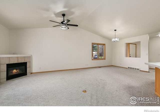 718 Brookhaven Ct, Fort Collins, CO 80525 - unfurnished living room featuring carpet, a ceiling fan, baseboards, a tile fireplace, and visible vents