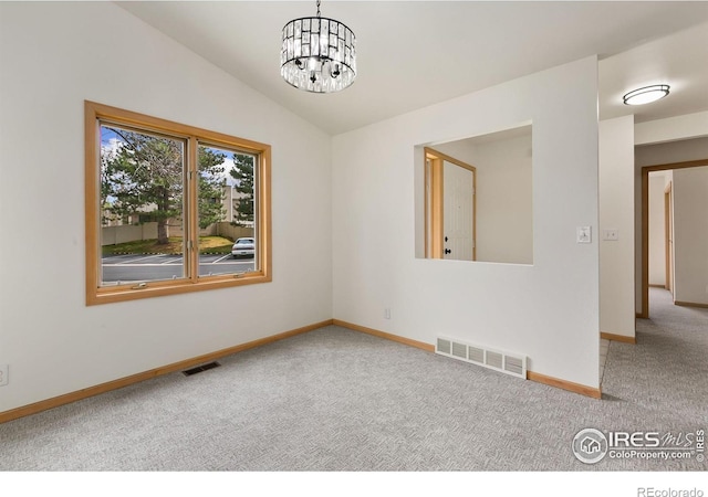718 Brookhaven Ct, Fort Collins, CO 80525 - unfurnished room featuring carpet floors, a notable chandelier, visible vents, and baseboards
